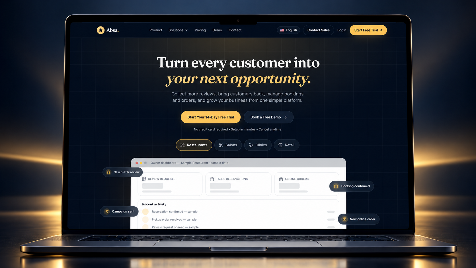 Absa Reviews website shown on a laptop with warm gold lighting